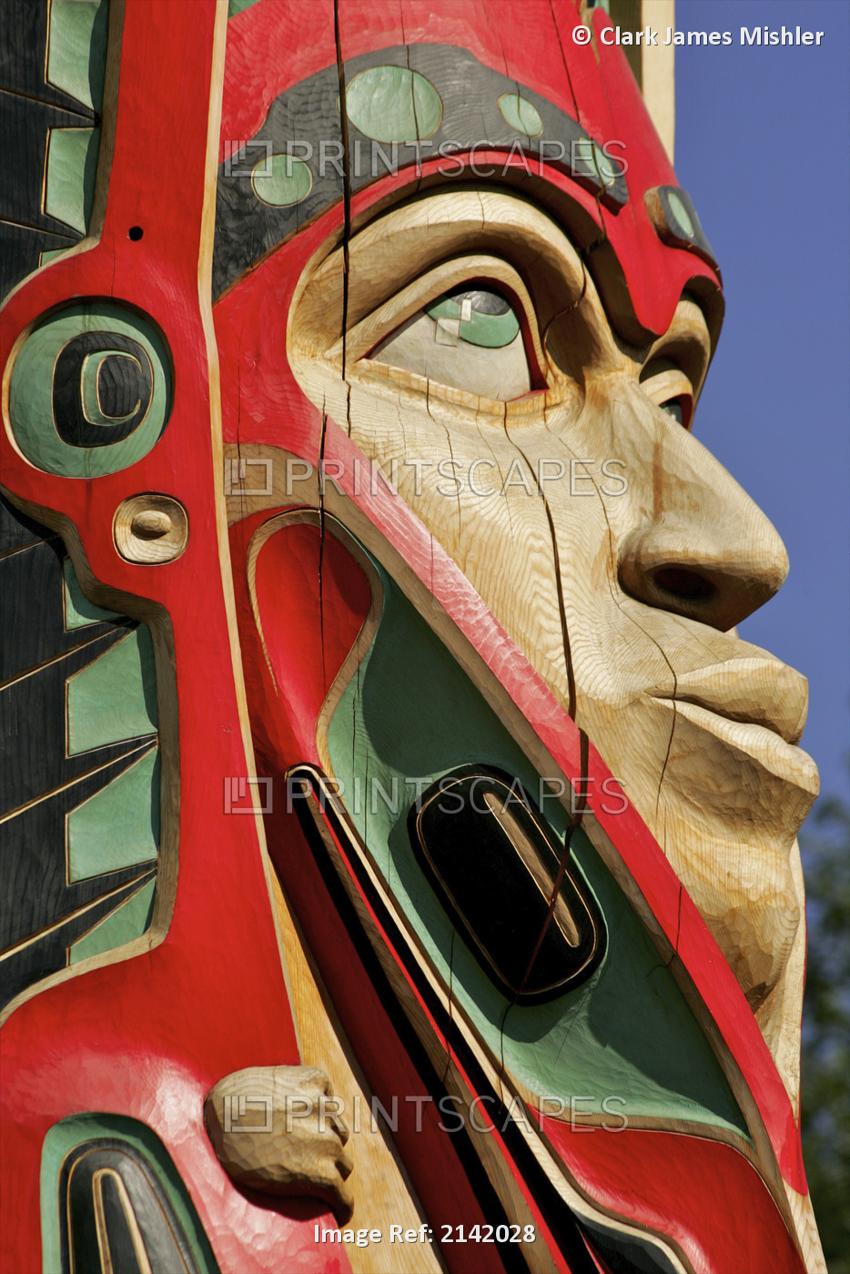Close Up Of A Face On A Traditional Haida Totem Carving In Ketchikan, Alaska