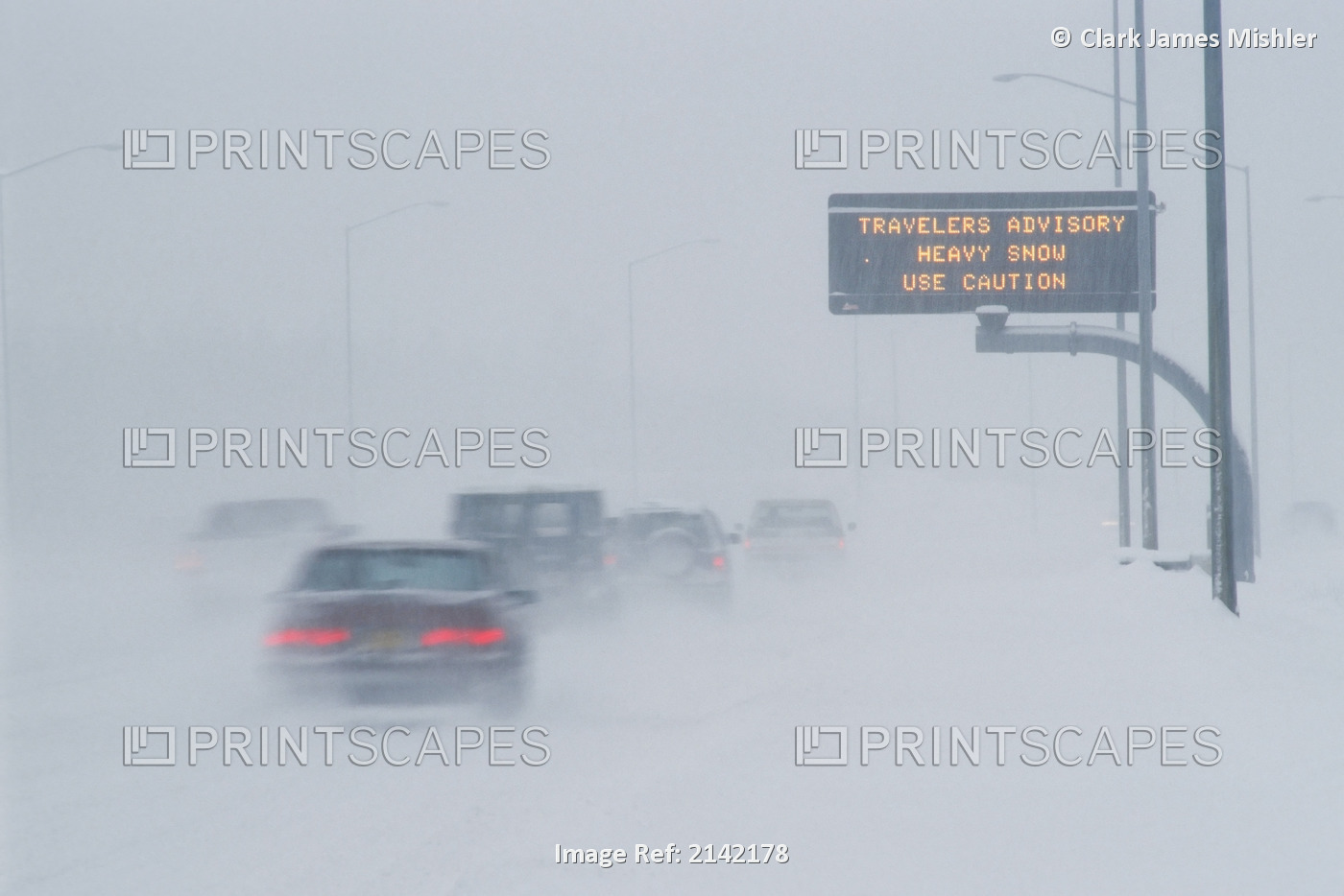 Cars On Highway In Snowstorm Advisory Sign Anchorage Ak/Nsouthcentral Winter
