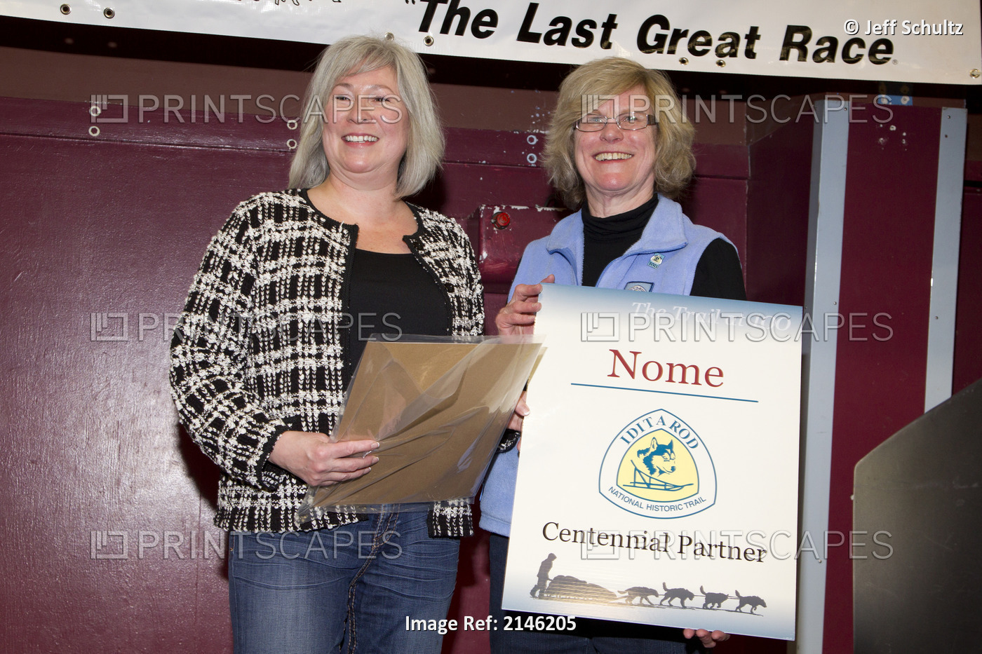 Iditarod National Historic Trail Alliance President Judy Bittner (R) Presents A ...