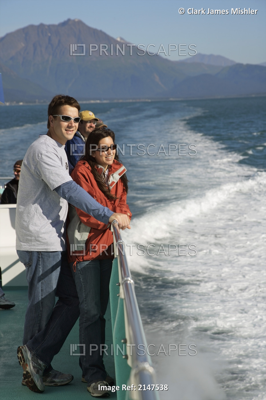 Couple View Scenery While Standing At The Railing On Board A Tour Boat In The ...