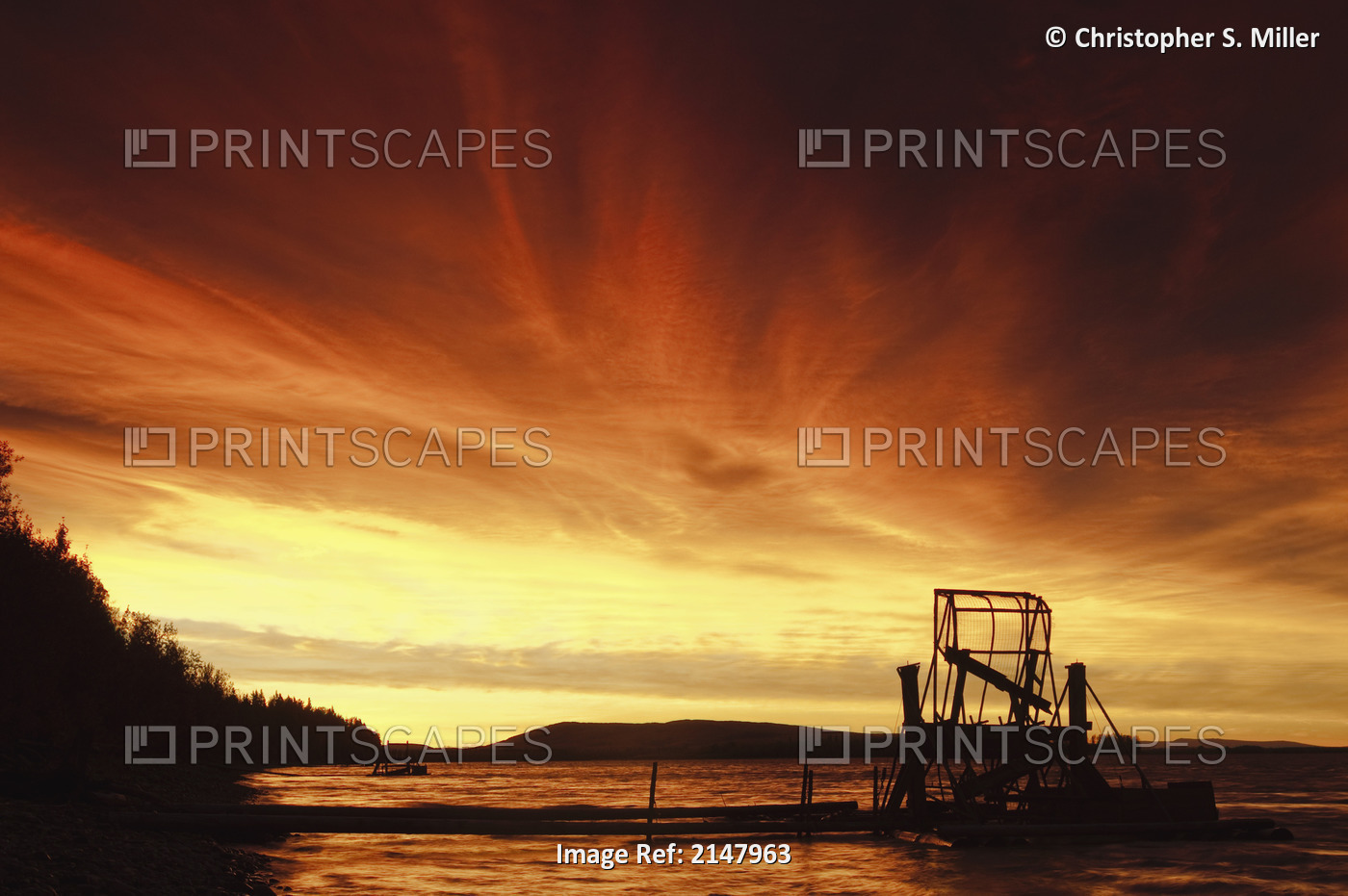 A Fish Wheel Spins During An Early Morning Sunrise On The Tanana River Near The ...