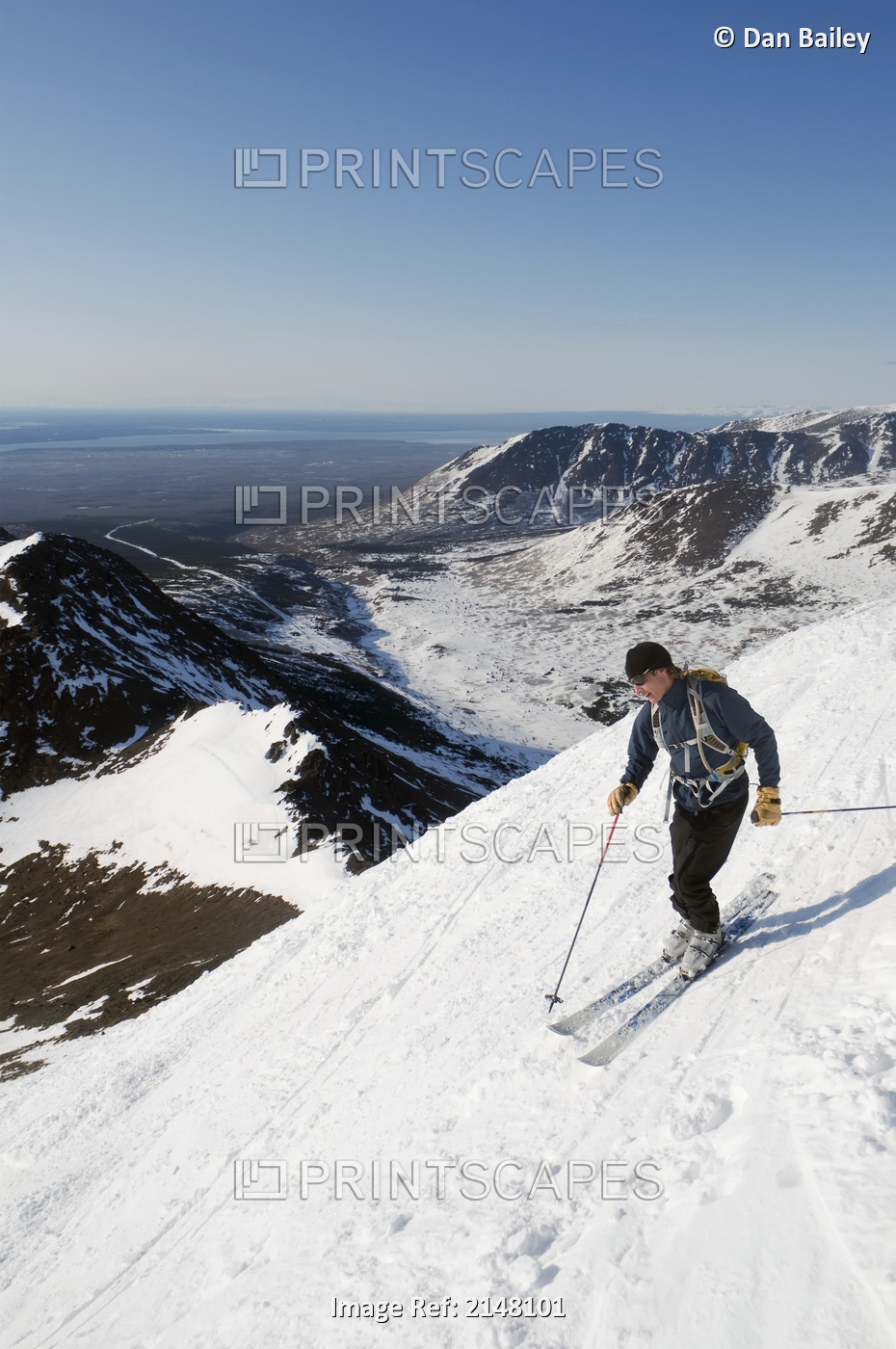 Man Backcountry Skiing From The Summit Of Peak 3 In The Chugach Mountains ...