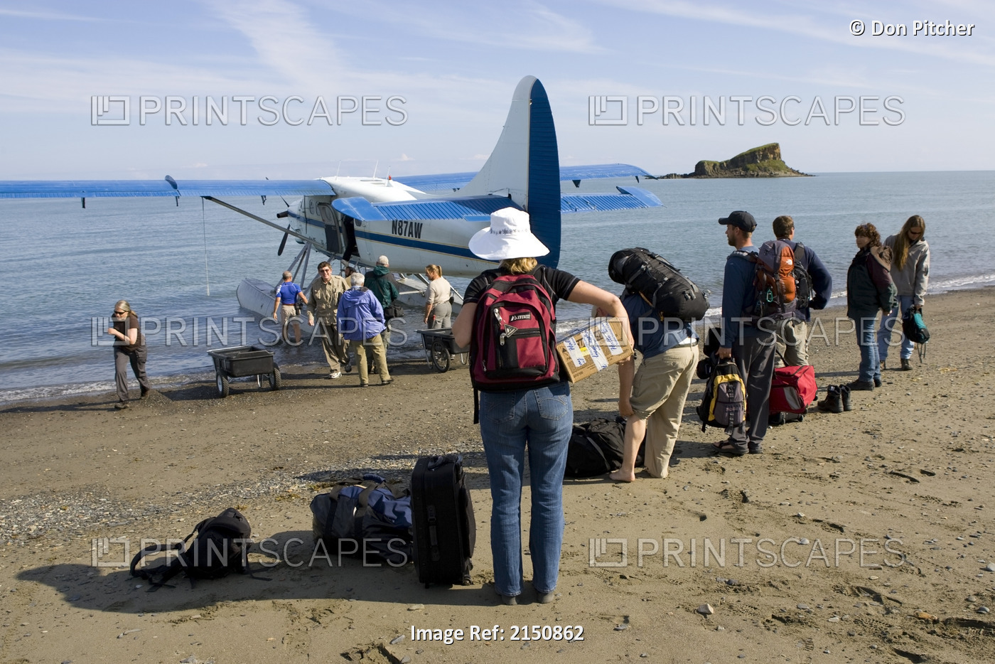 Loading Floatplane With Guests From Hallo Bay Bear Lodge In Kaguyak Area Of ...