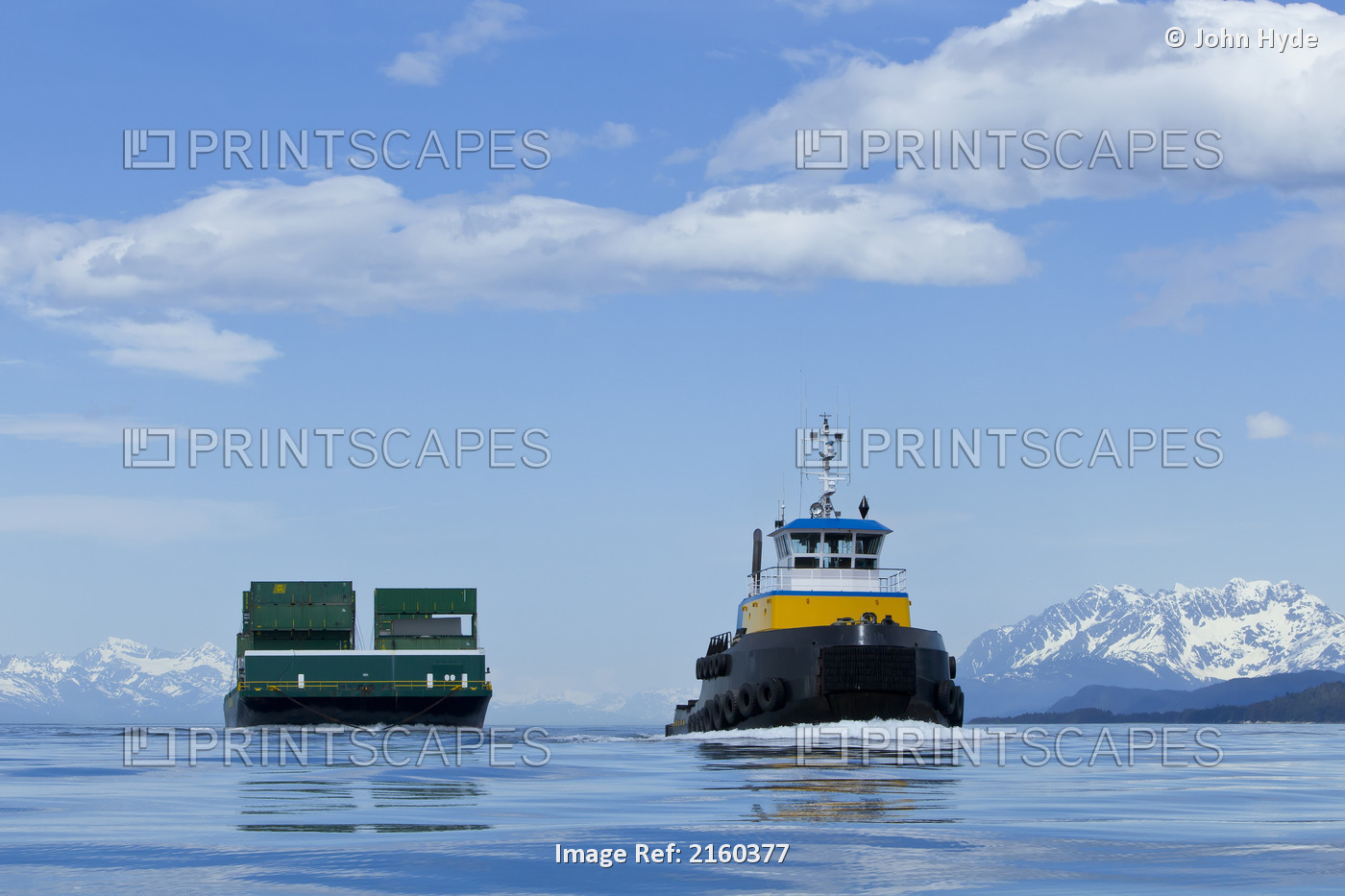 A Tug Pulling A Barge Cruises Through The Inside Passage On Its Way South From ...