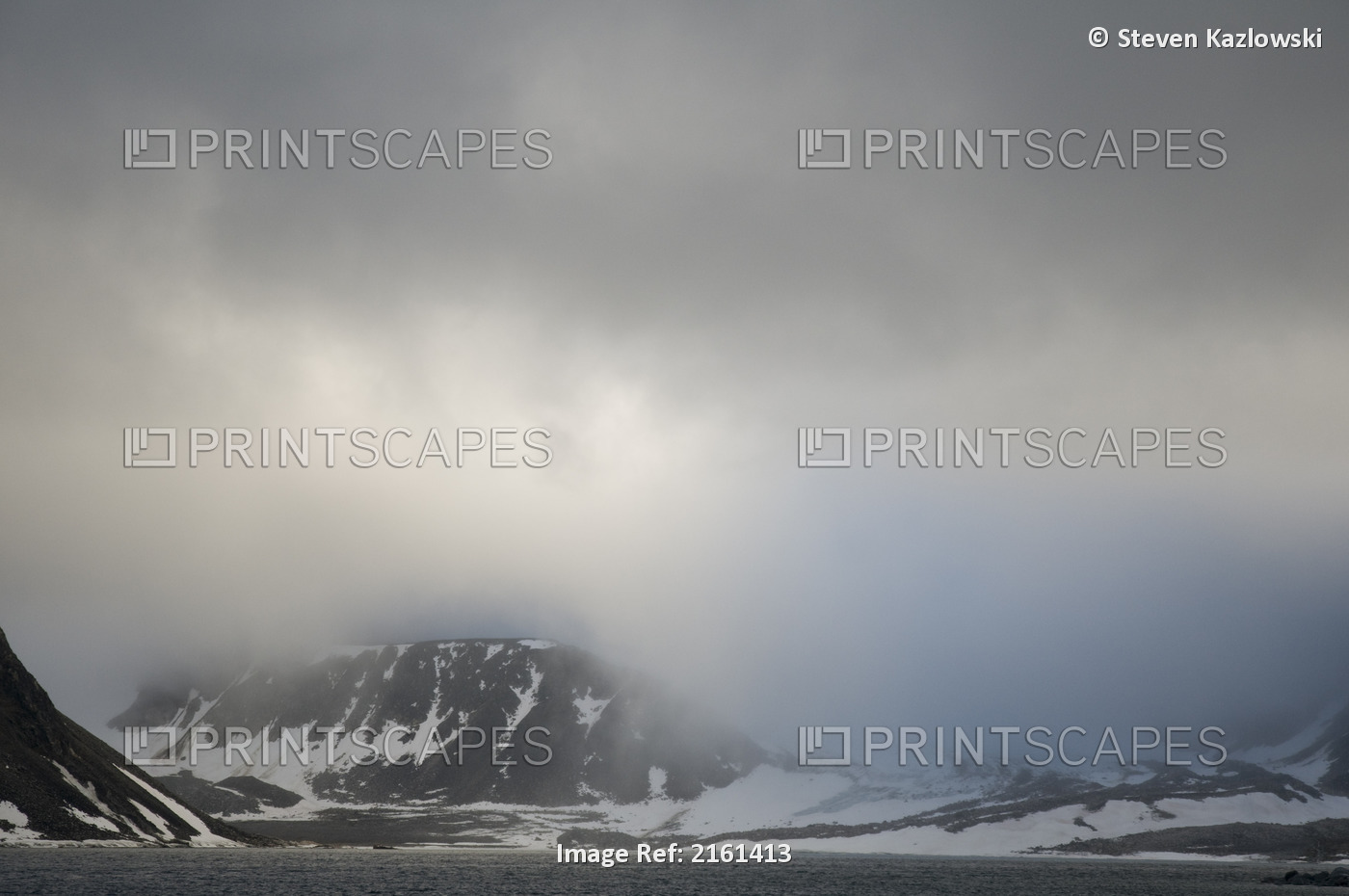 Clouds Shroud A Rugged Coastal Landscape In Summertime, Svalbard Archipelago, ...