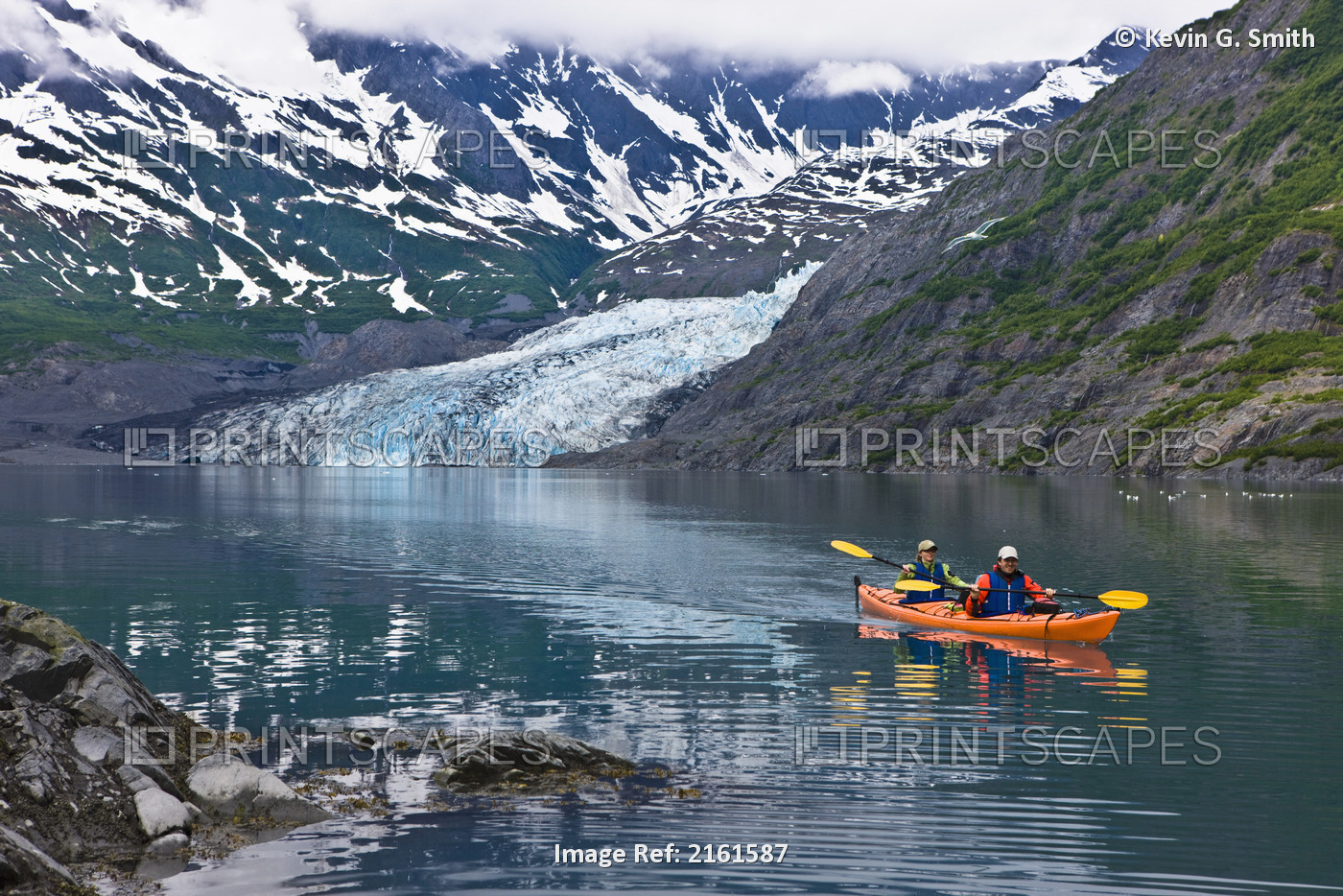 Family Kayaking In Shoup Bay With Shoup Glacier In The Background, Prince ...