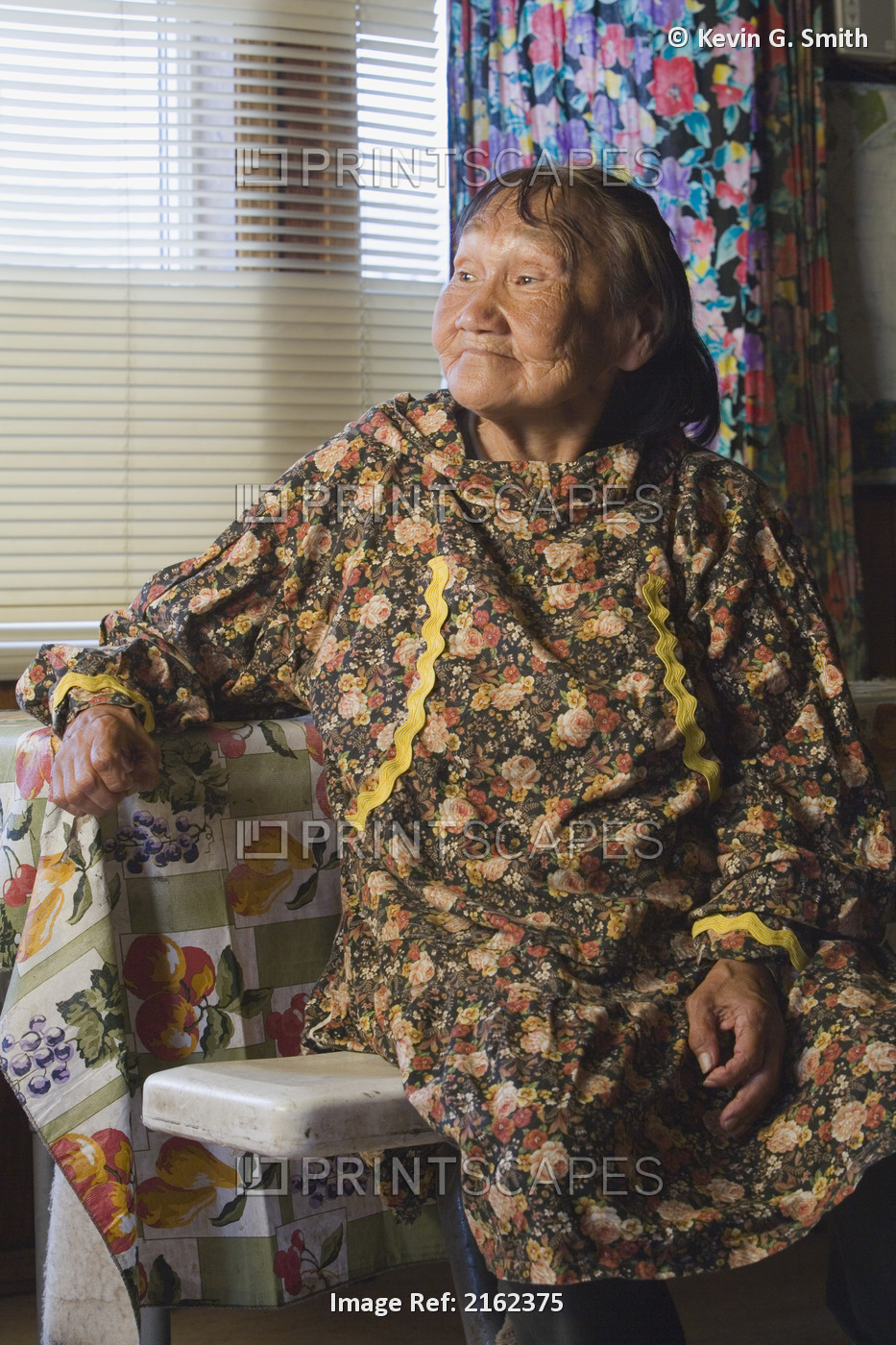 Portrait Of Elder Yupik Native Woman Sitting @ Her Kitchen Table Inside ...