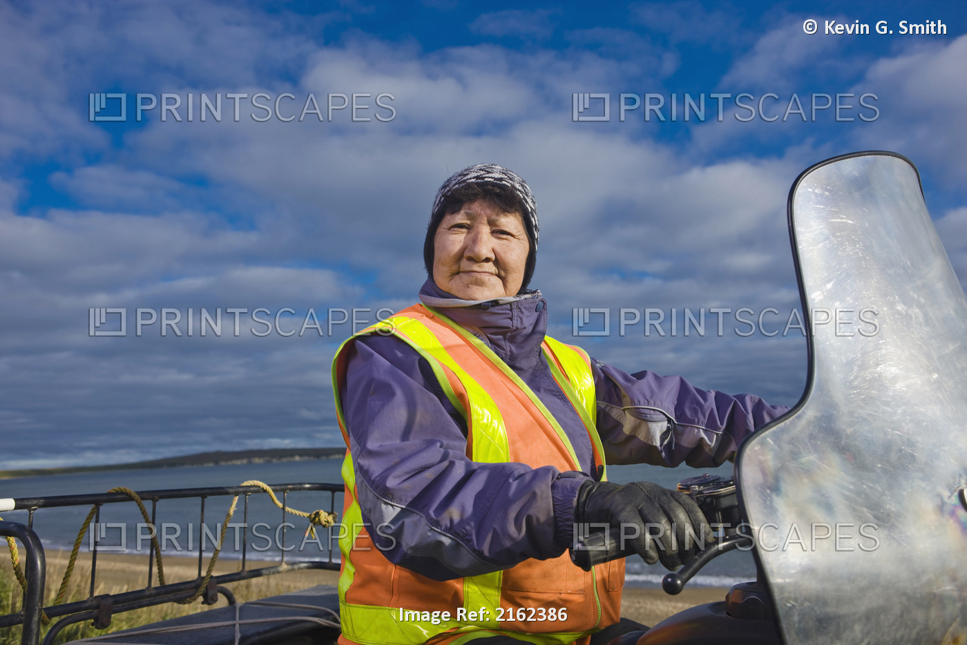 Inupiat Woman Construction Worker Wearing A Safety Vest Riding A Four Wheeler ...