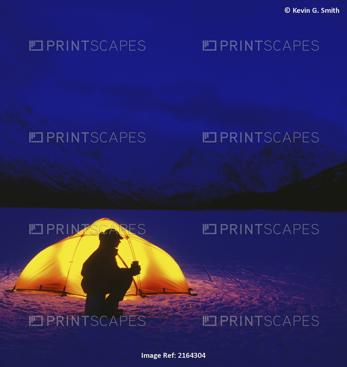 Woman Silhouetted By Lighted Tent Eklutna Lake Sc Ak