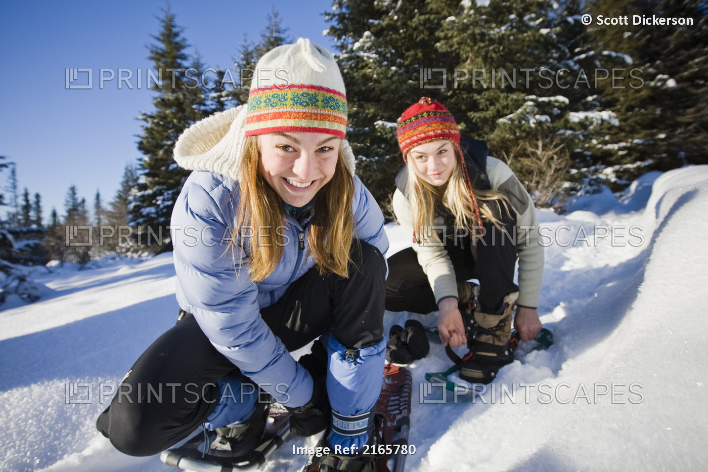 Two Young Girls Snowshoeing On A Sunny Winter Day, Homer, Kenai Peninsula, ...
