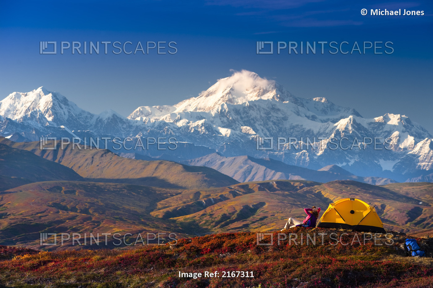 A Woman Relaxes Next To Her Tent In Peters Hills With A View Of Mt. Mckinley In ...