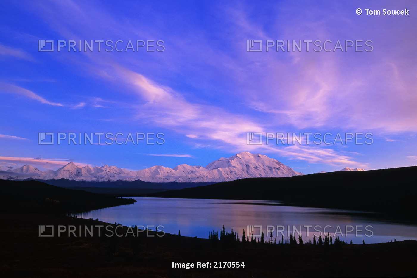 Mount McKinley and Alaska Range reflected in Wonder Lake at sunrise; Alaska, ...