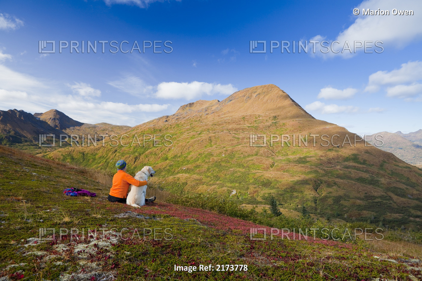 Mature Woman Hikes And Enjoys Scenery With Dog On Old Womens Mountain, Kodiak, ...