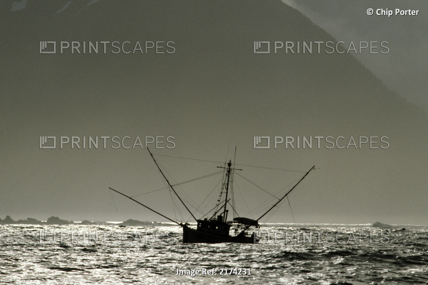 Silhouetted Salmon Troller Fishing Off Icy Point, Gulf Of Alaska During ...