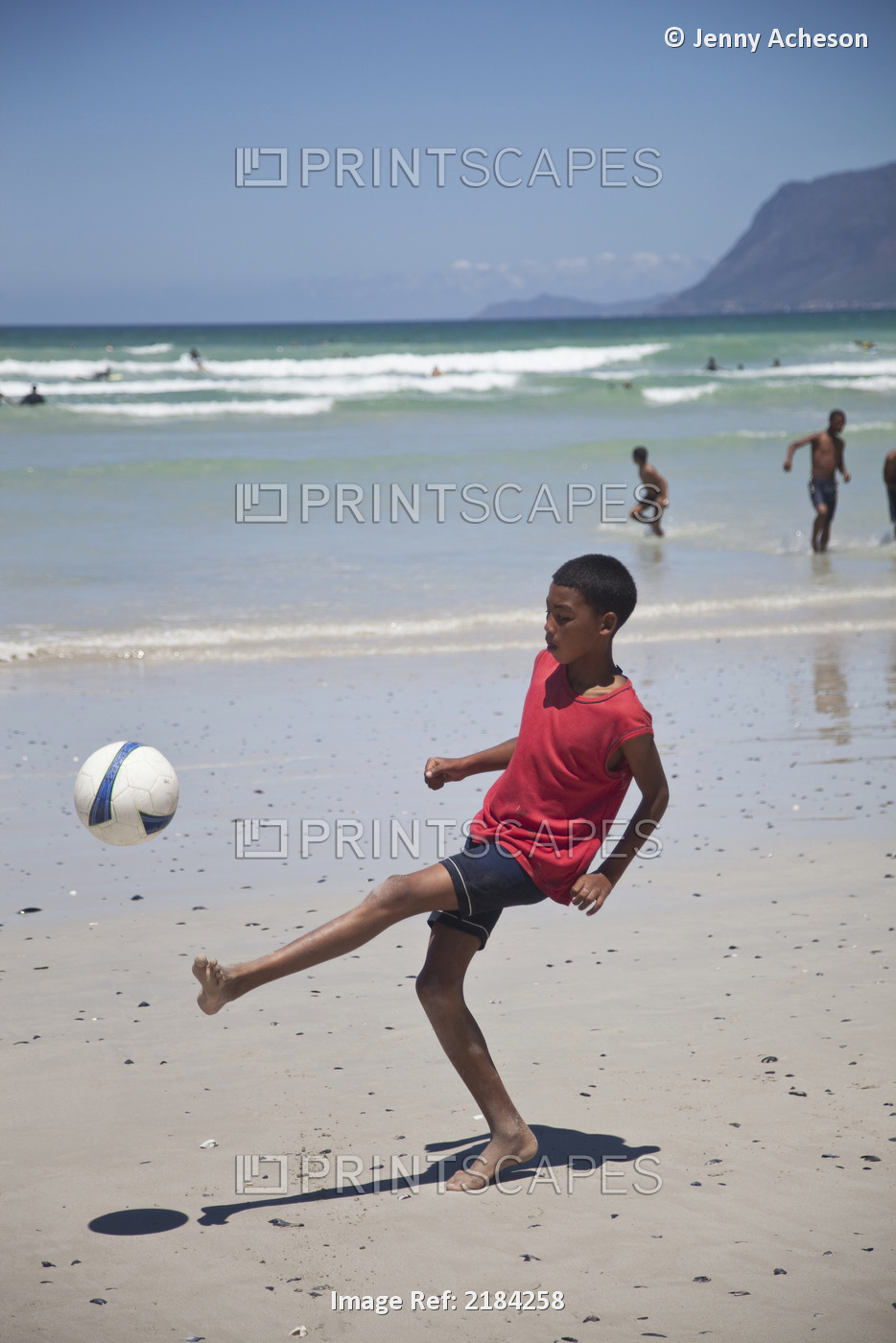 South Africa, Muizenberg; Cape Town, Local Boys Playing Football On Beach