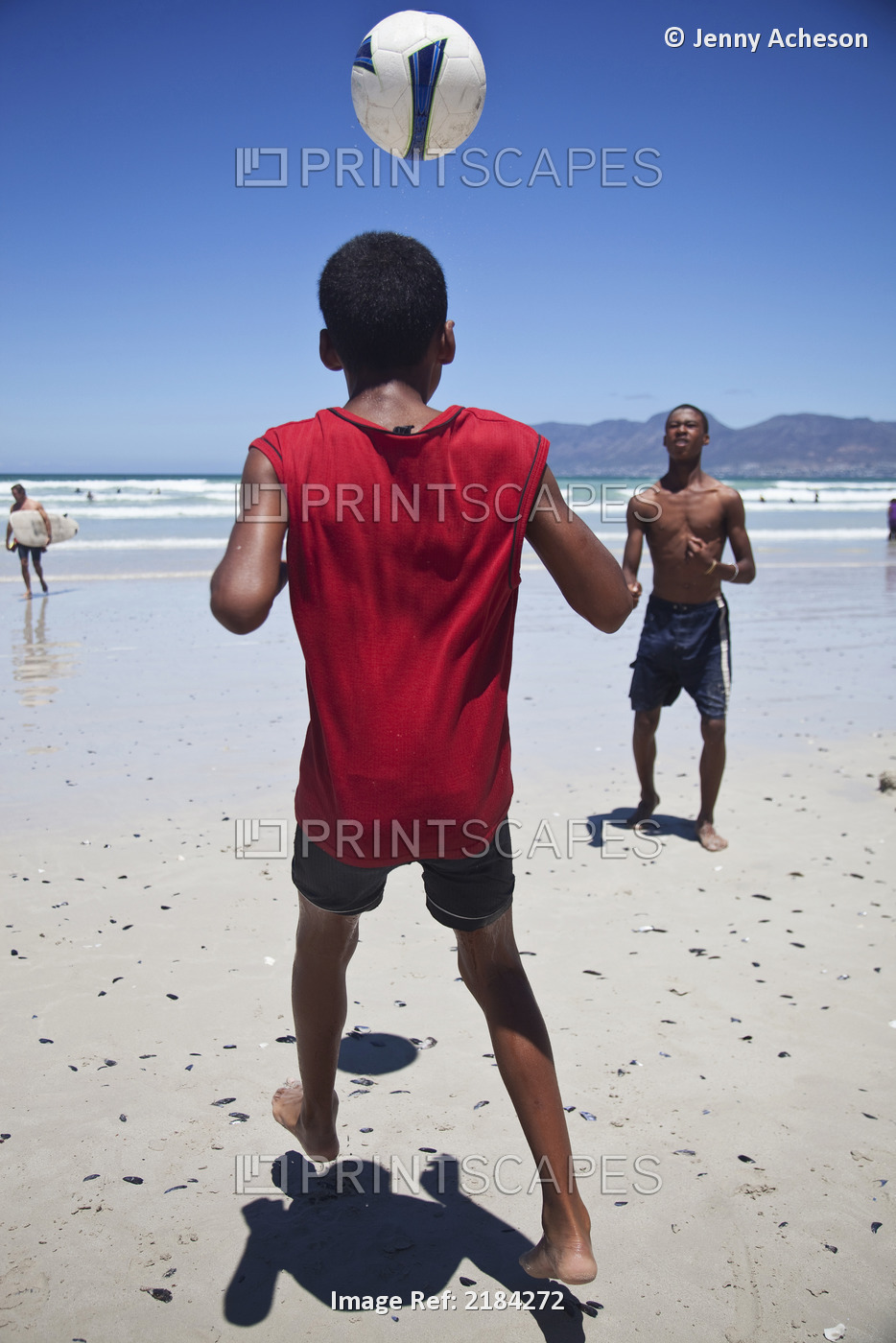 South Africa, Muizenberg; Cape Town, Local Boys Playing Football On Beach
