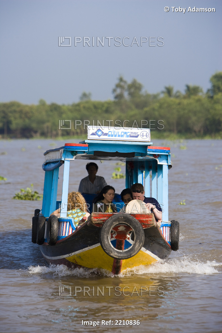 Tourist On Boat Trips In The Mekong Delta Close To Vinh Long, Vietnam.