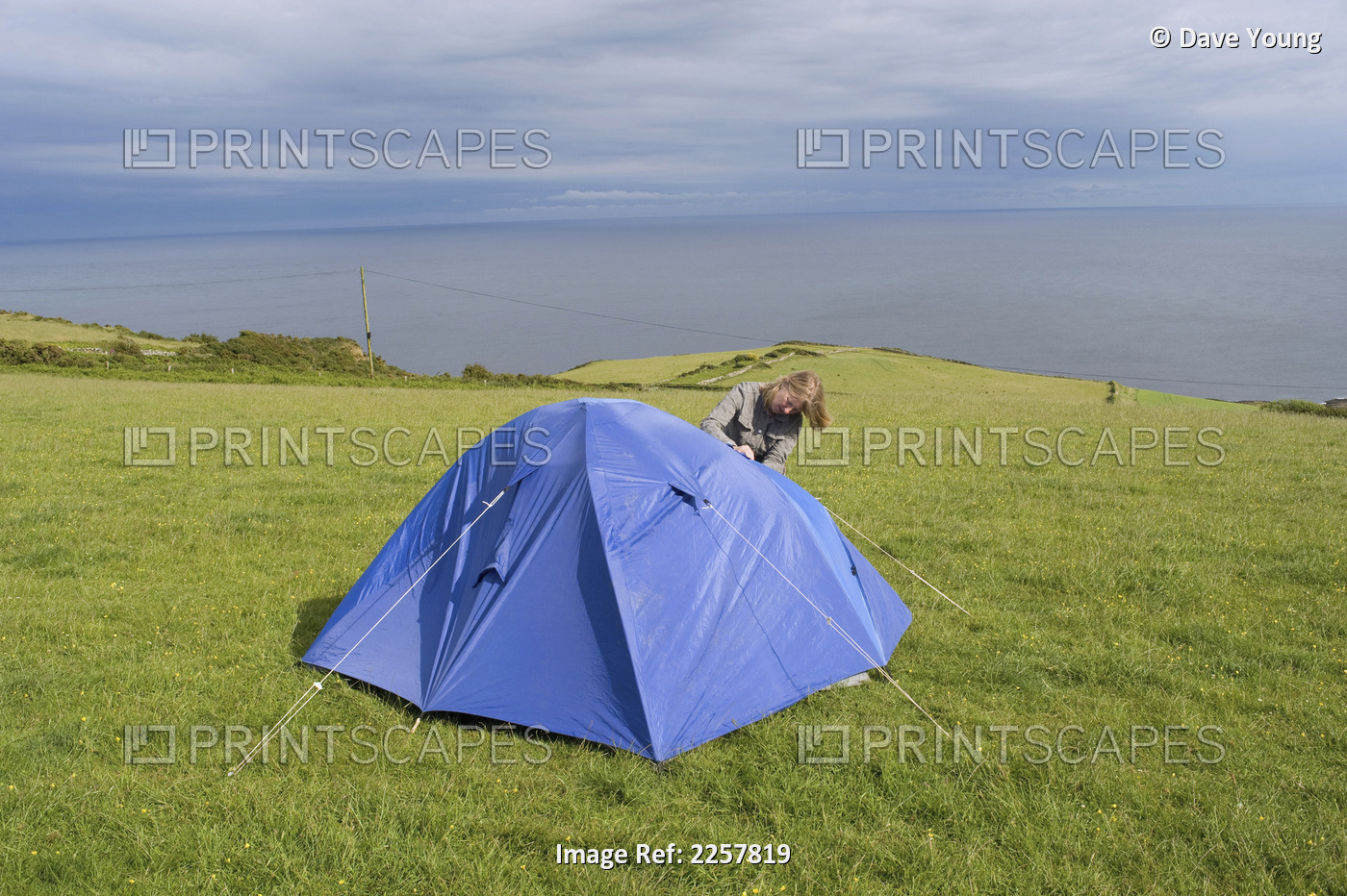 Uk, England, Devon, Woman Standing By Tent; East Prawle