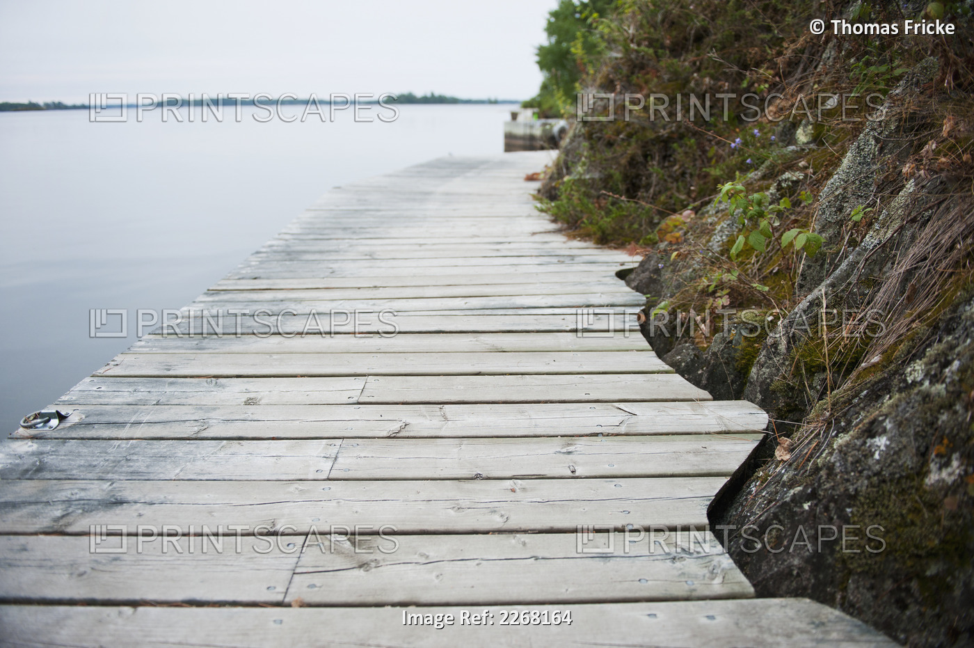 Boardwalk along a lake shoreline; kenora ontario canada
