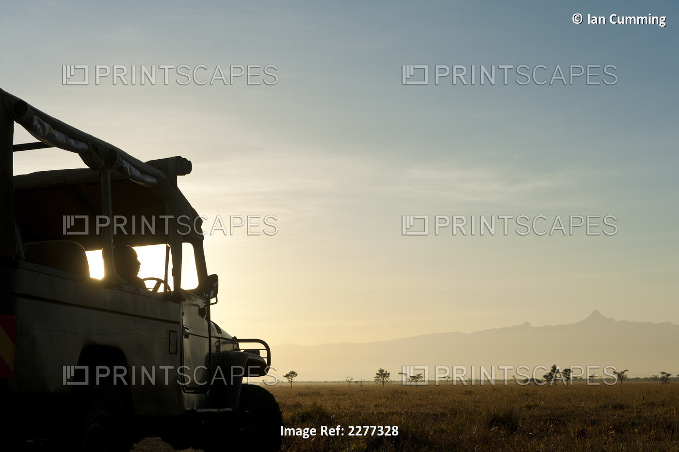 Silhouette Of Driver In 4x4 In Front Of Mt Kenya At Dawn, Ol Pejeta ...