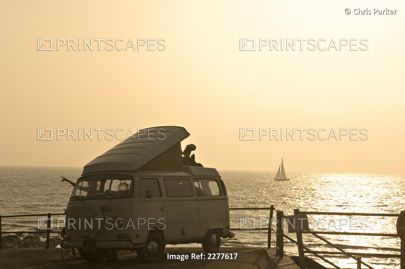A Volkswagen Camper Van Parked Along The Seafront; Broadstairs, Kent, England
