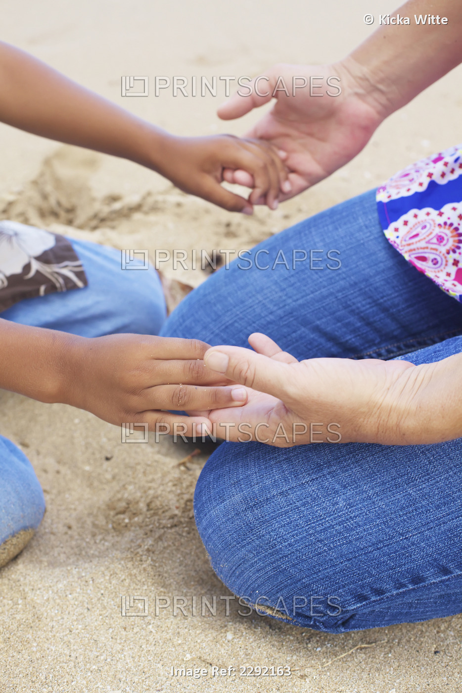 Mother and son holding hands; Hawaii united states of america