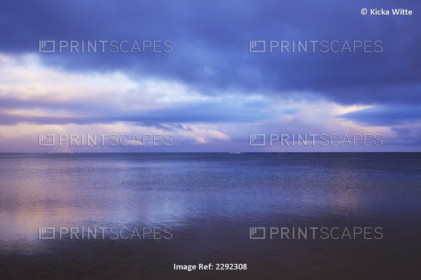 Pink sunlight reflected on the tranquil water at sunset; Hawaii united states ...