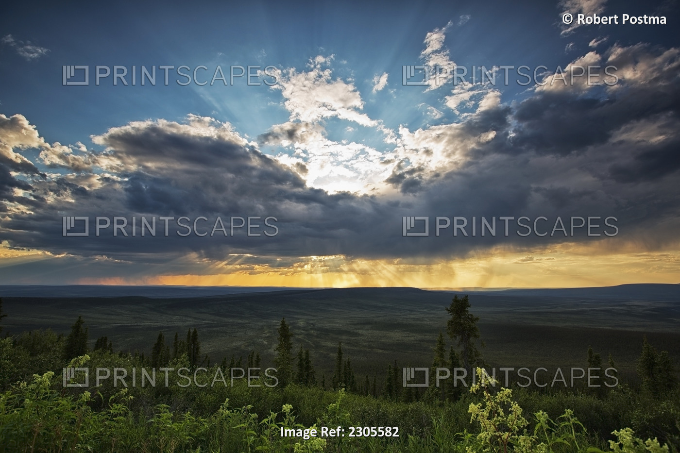Rays Of Light Glow From Behind Gathering Storm Clouds Over Eagle Plains; Yukon ...