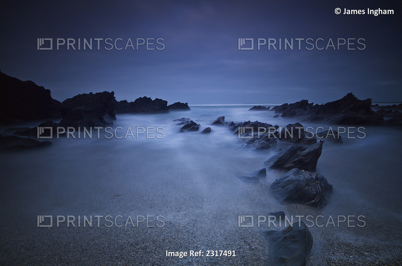 Long exposure of rocks on the beach at night;Newquay cornwall england