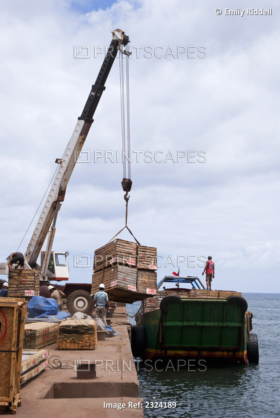 Crane Loads Crates On To Freighter Destined For Valparaiso; Easter Island, Chile