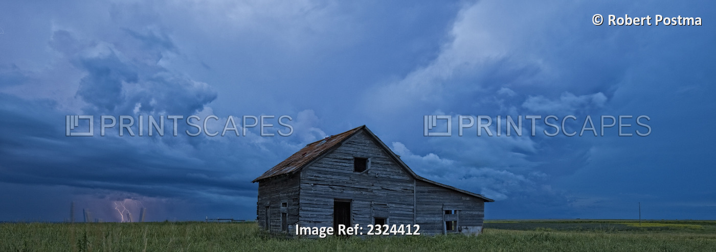 Lightning Strikes Over The Prairies As It Approaches An Old Abandoned Farm ...