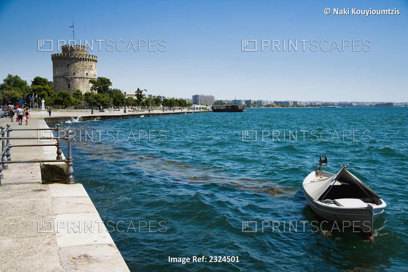 Greece, Small fishing boat and White Tower; Thessaloniki