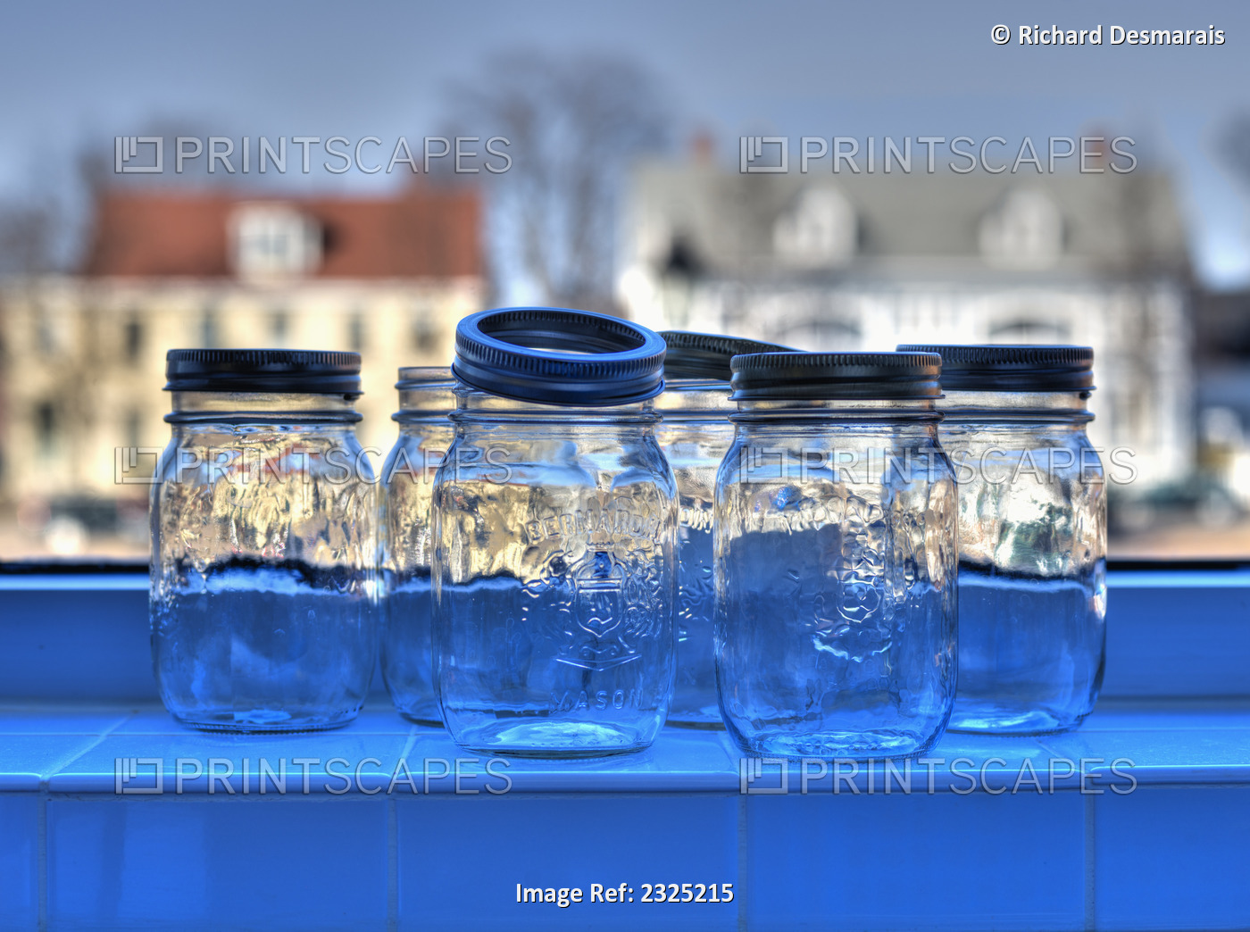 Empty Mason Jars On A Blue Windowsill; Charlottetown, Prince Edward Island, ...
