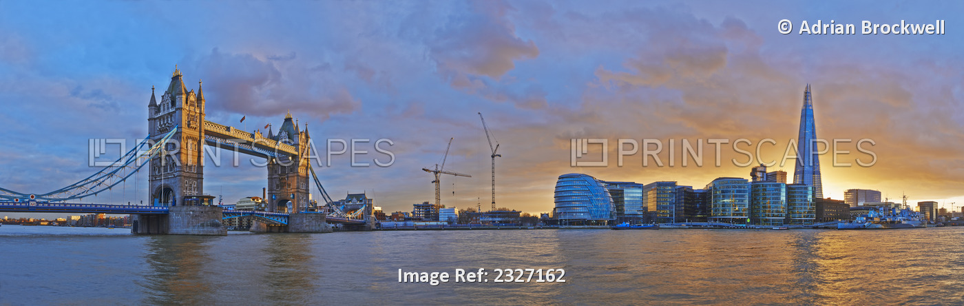 UK, City Hall and Tower Bridge at sunset from River Thames; London, Panoramic ...