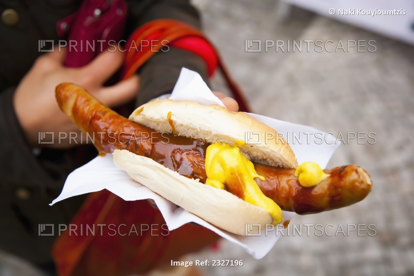 Germany, german style large hotdog Christmas Markets; Berlin, Bratwurst