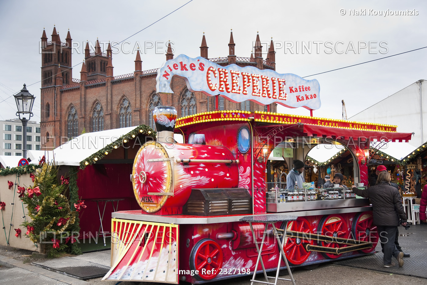 Germany, drink and gifts. Christmas Markets; Berlin, St Hedwigs Catherdral in ...