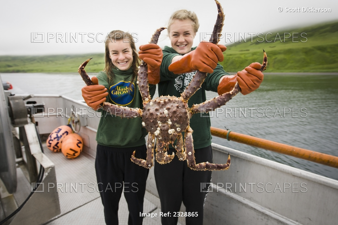 Commercial Fishing Deckhands, Claire And Emma Teal Laukitis, Hold Up A Live ...