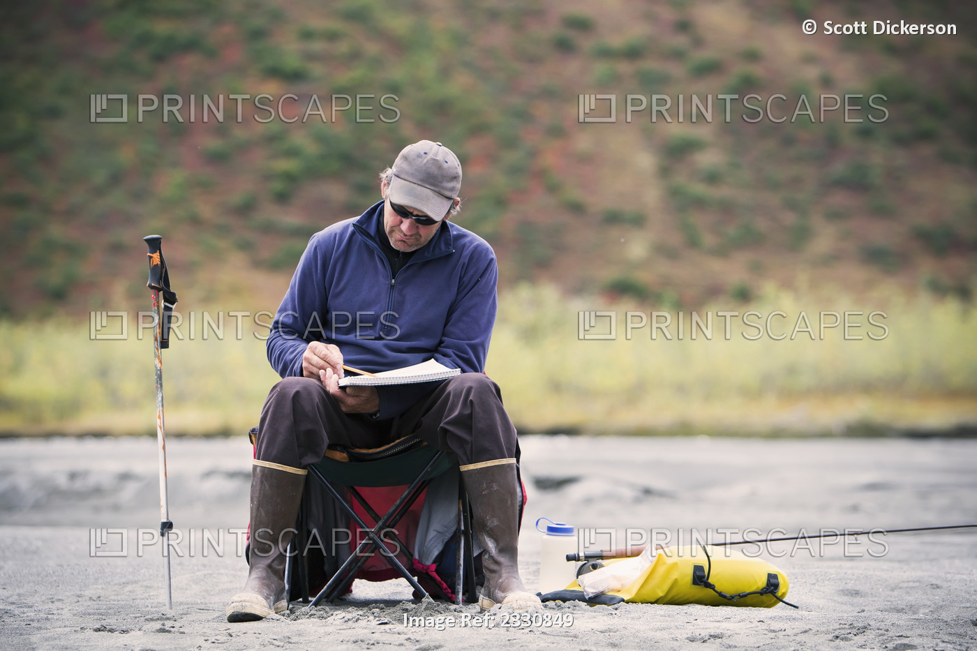 Rafter Reading Book At Camp Off Noatak River In The Brooks Range, Gates Of The ...