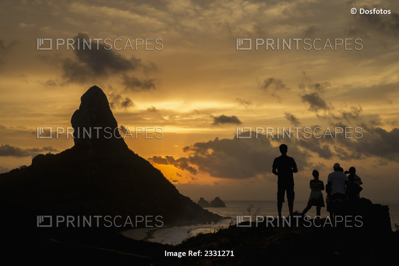 Brazil, Pernambuco, People admiring sunset over Morro do Pico from Forte dos ...