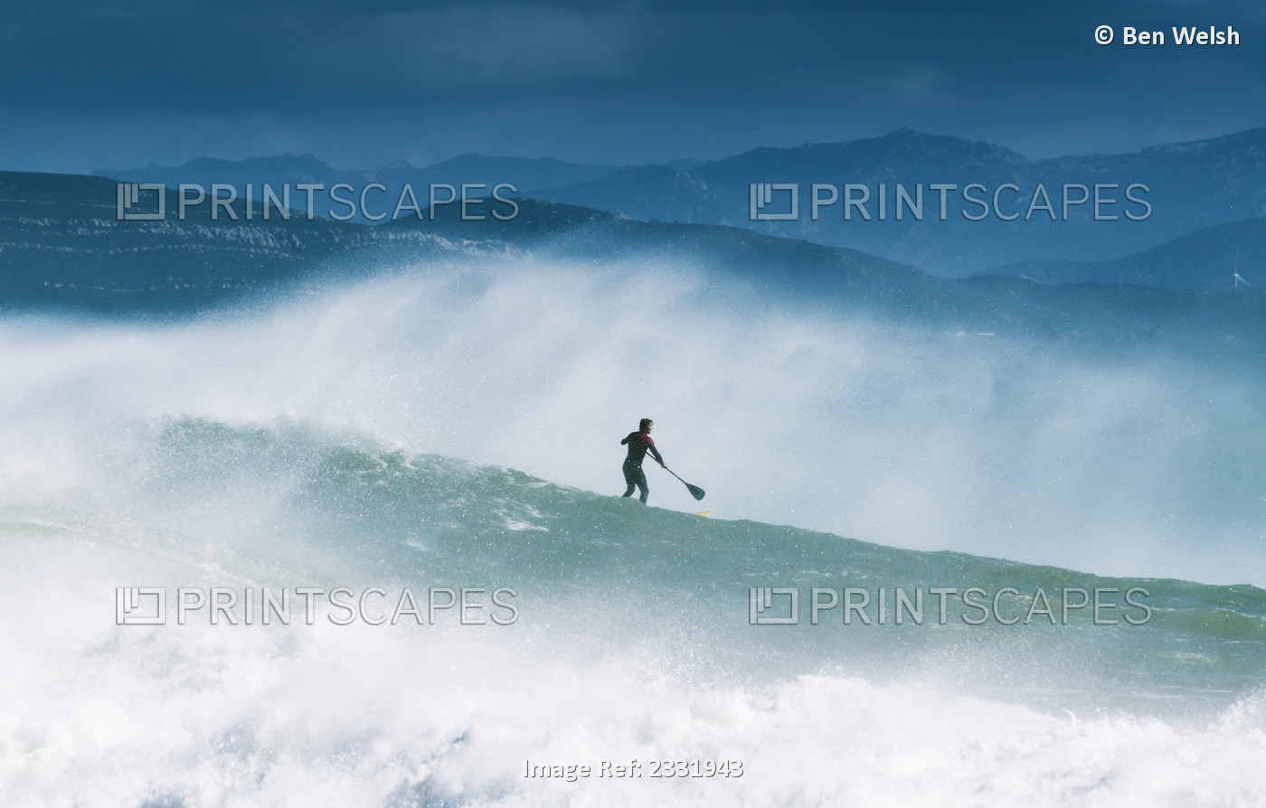 Paddleboarding In The Waves Along The Coast Of Cape Trafalgar; Cadiz, ...