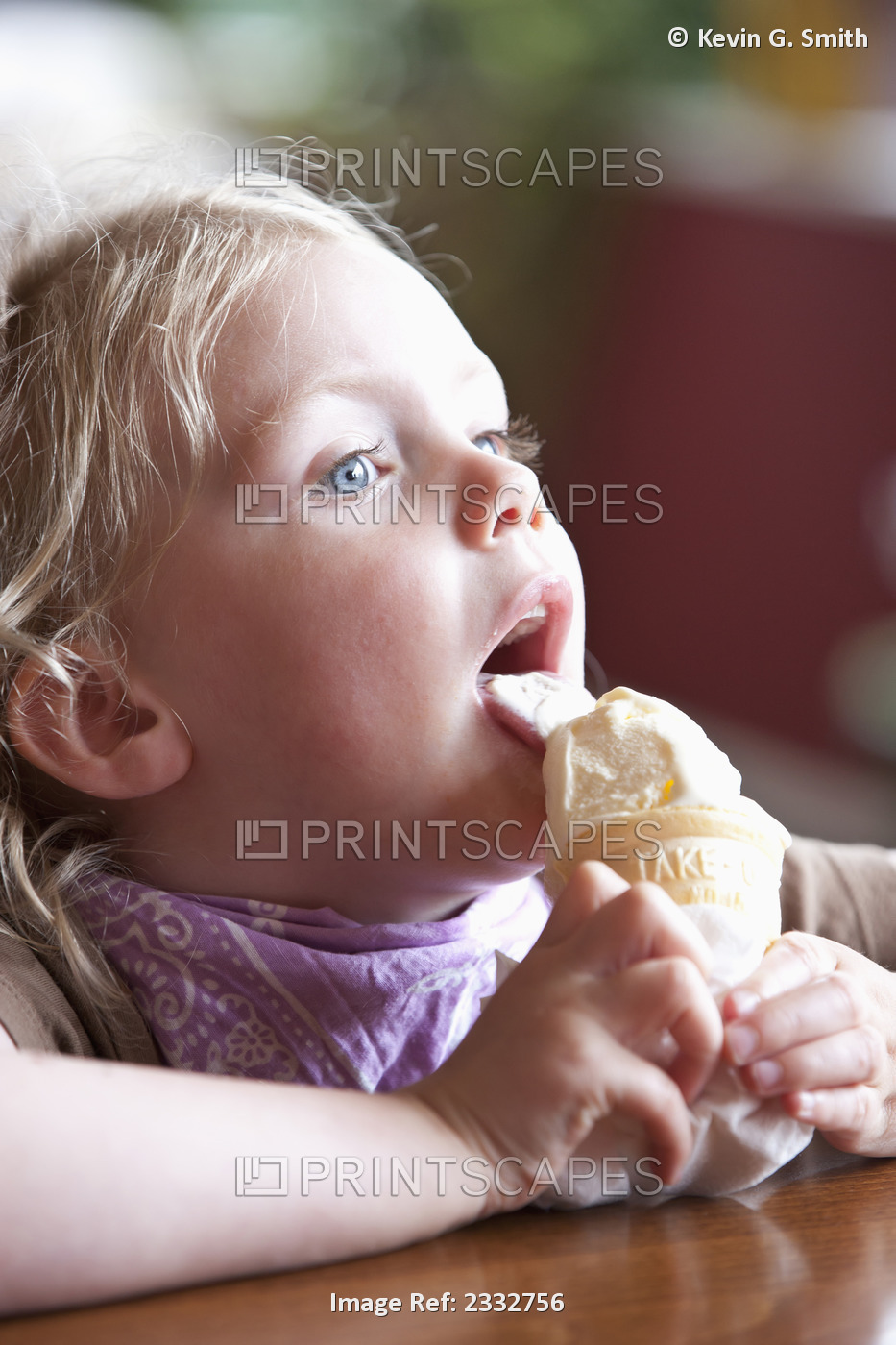 Young Girl Eating A Ice Cream Cone While Sitting In A Coffe Shop On A Rainy Day ...