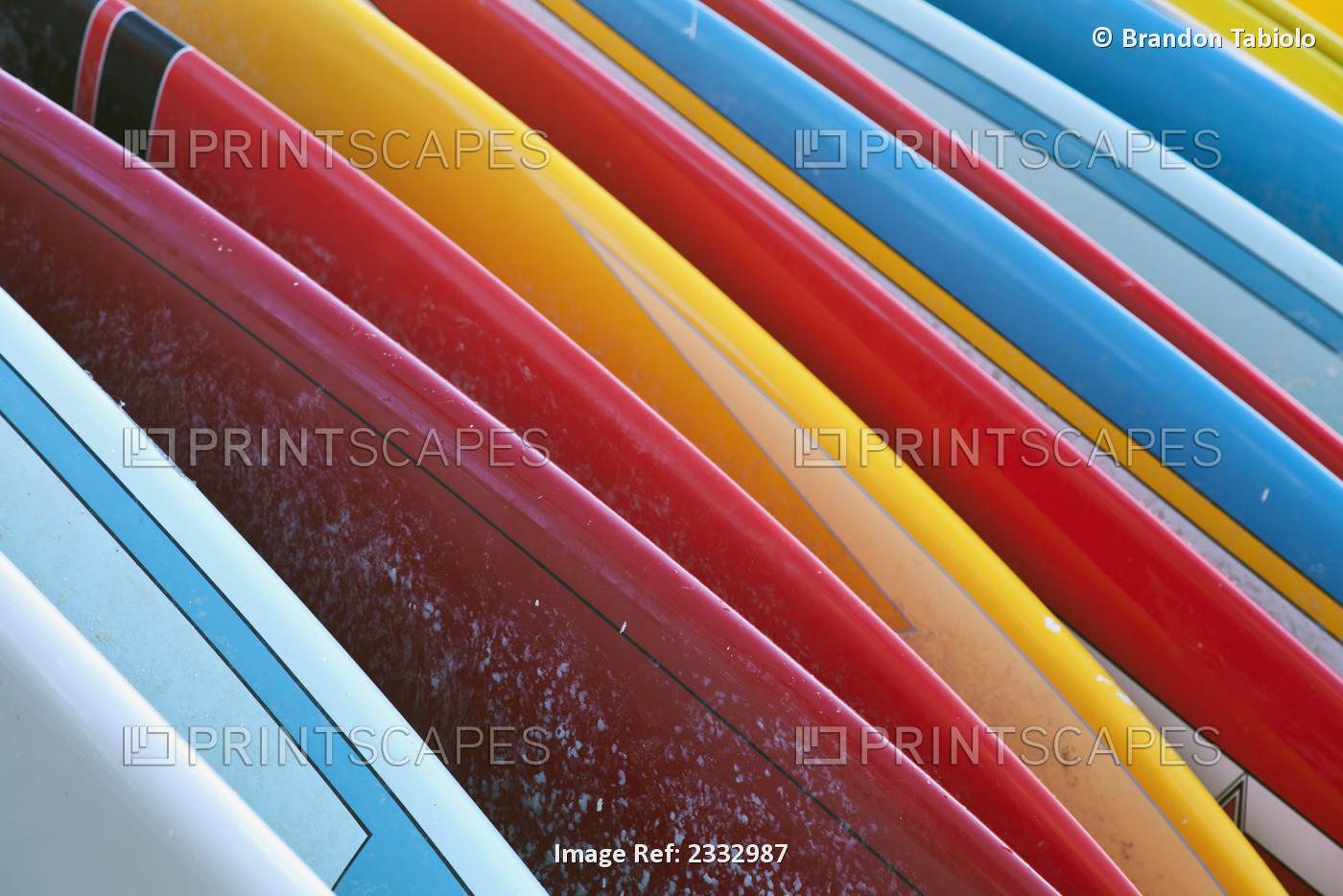 Close Up Of Coloured Surfboards Lined Up; Honolulu, Oahu, Hawaii, United States ...