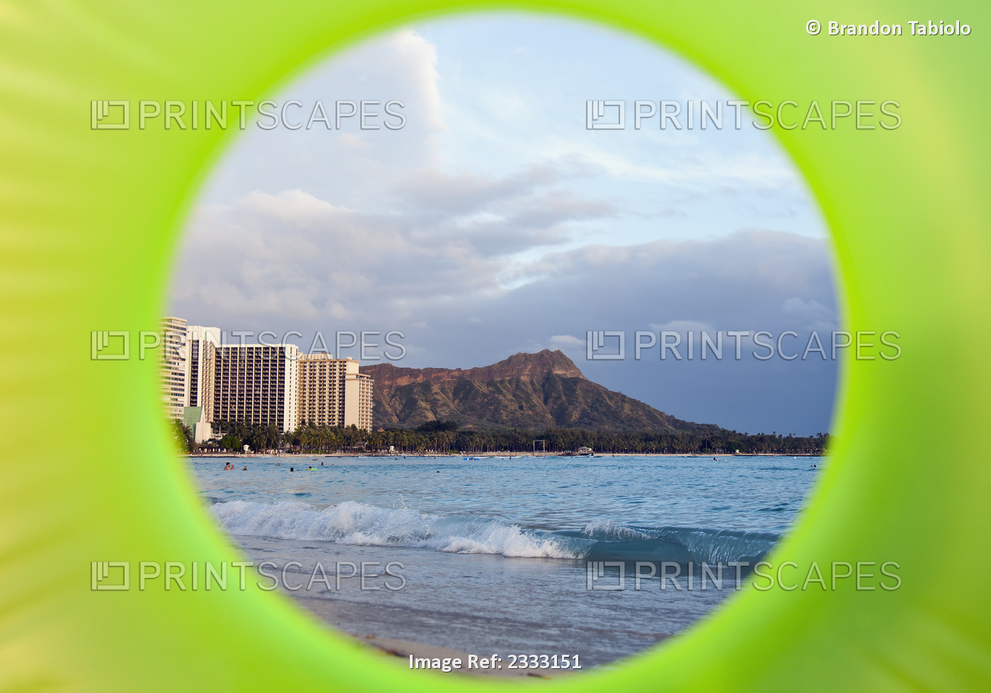 View Of Diamond Head Seen Through A Green Inflatable Tube; Waikiki, Oahu, ...