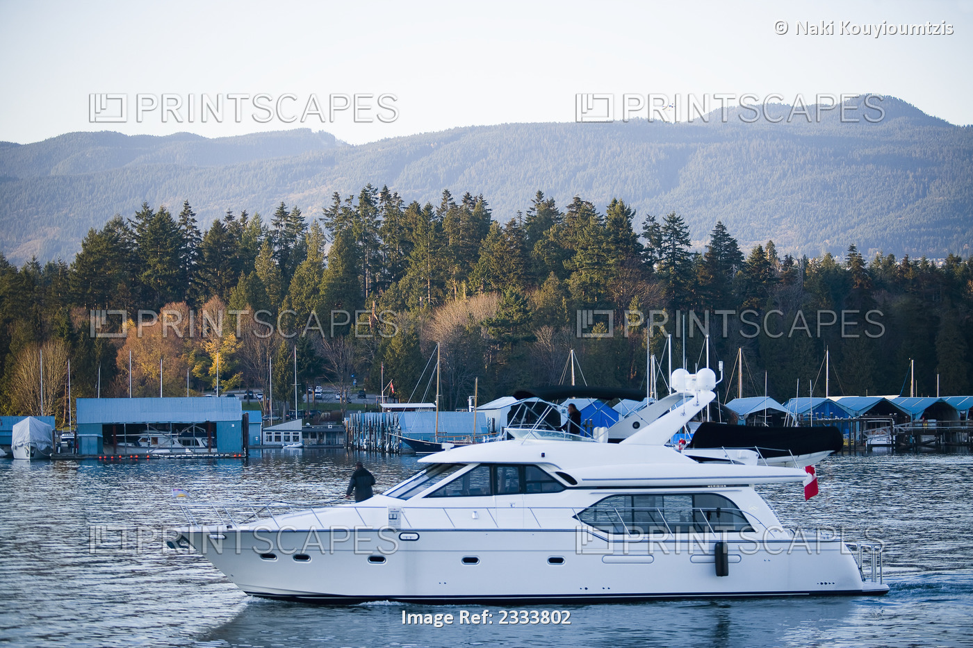 Motorboat Sailing Out Of Harbor, Vancouver Waterfront; Vancouver, British ...