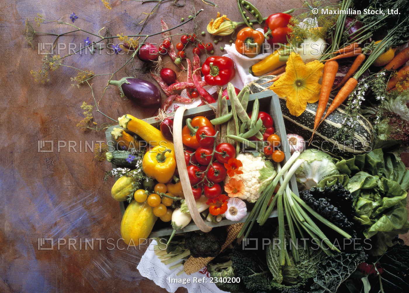 Agriculture - Mixed vegetables in and around a basket; corn, bell peppers, ...
