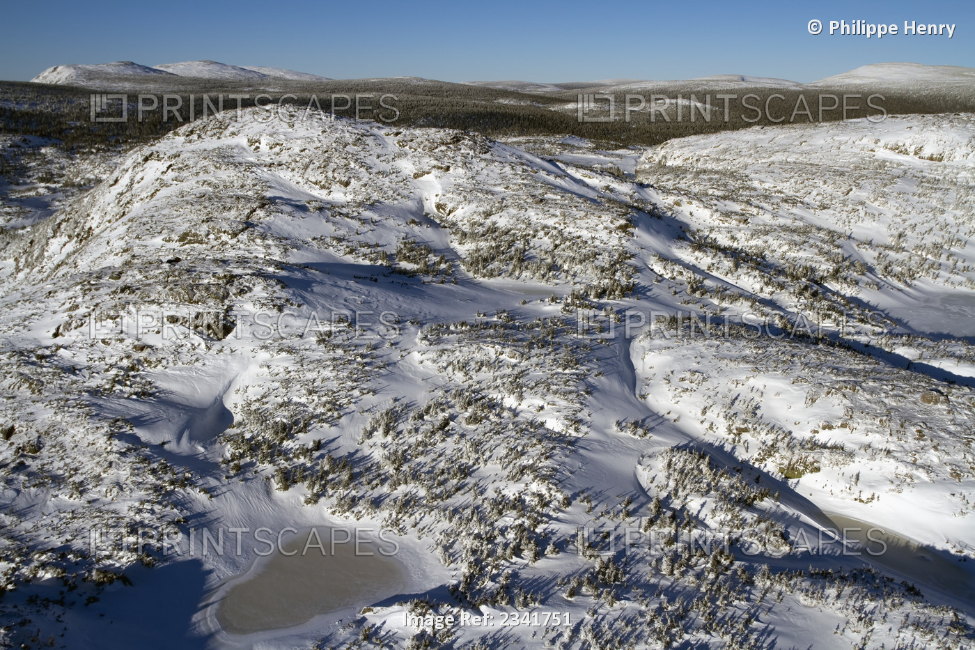 Part of the mcgerrigle mountains and frozen lake in gaspesie national park; ...