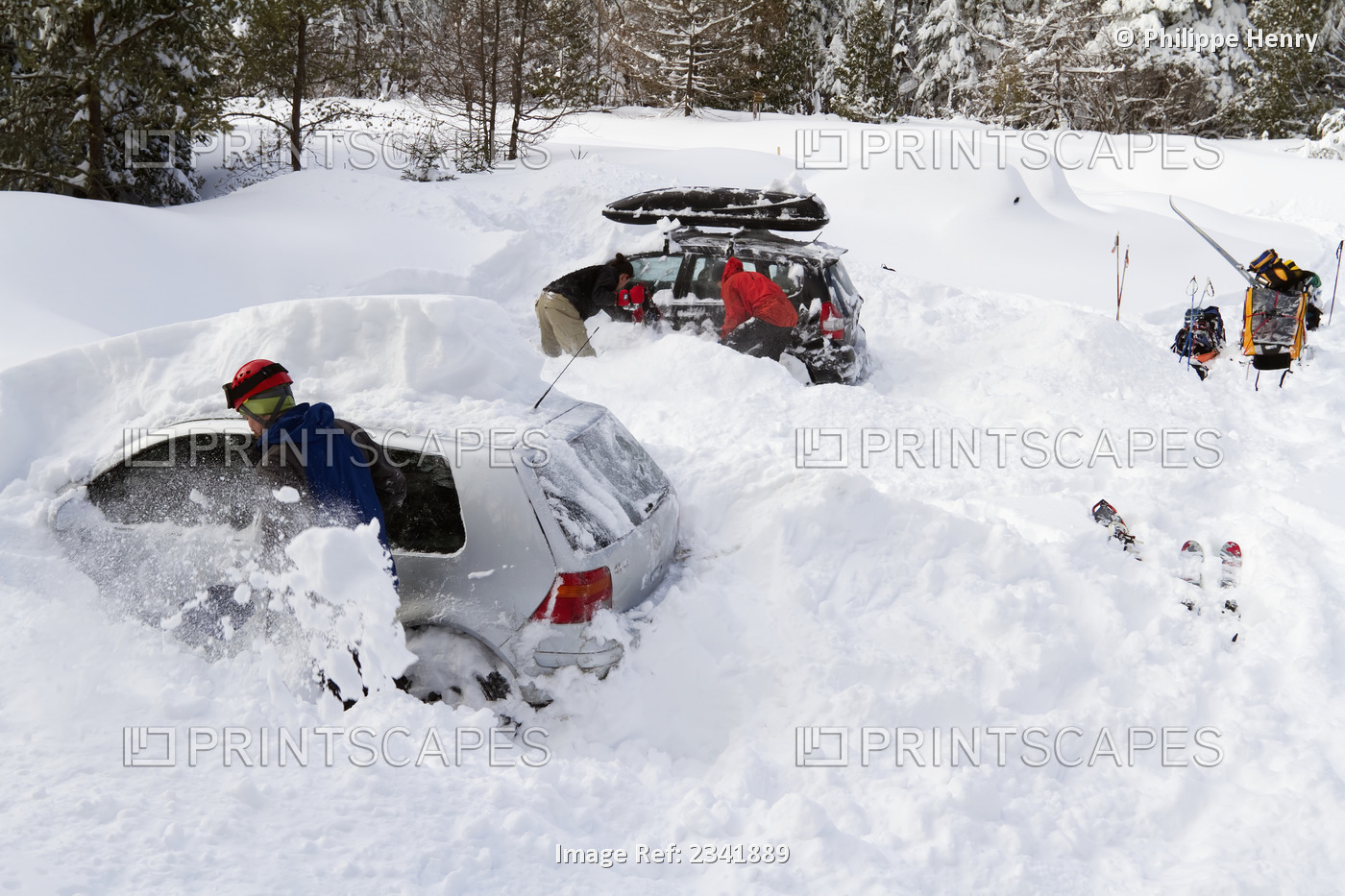 Owners Removing Snow From Buried Cars In Gaspesie National Park; Quebec, Canada