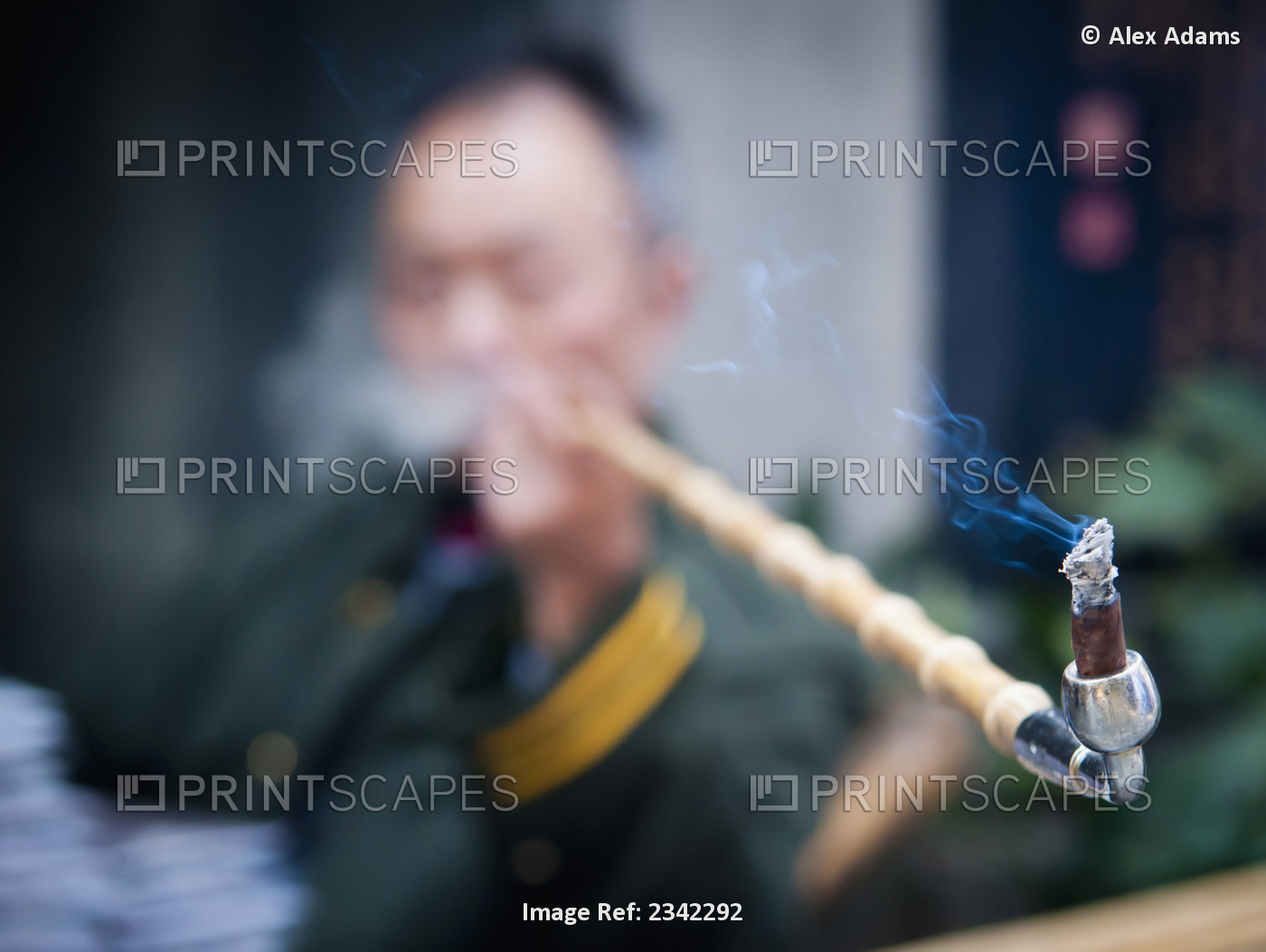 Man Smoking Pipe; China