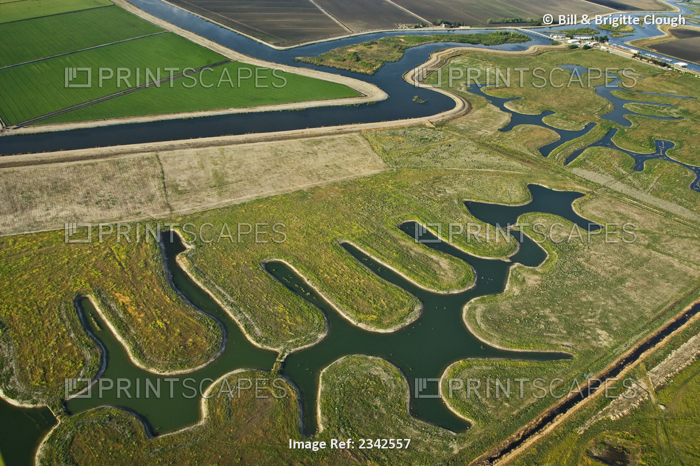 Agriculture - Aerial view of farmland, both cultivated and fallow, and river ...