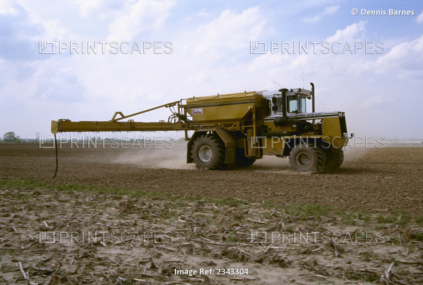 Agriculture - Field Preparation, applying fertilizer to field prior to planting ...